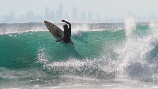 Surfer on wave Ultra HD