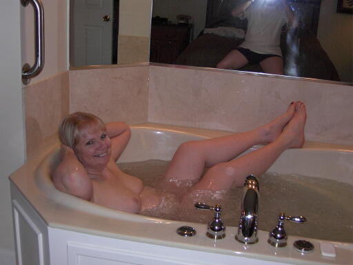 Nancy feeling sexy while soaking in the tub at the Maine resort.