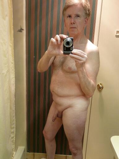 Andrew self photo nude standing in the bathroom.