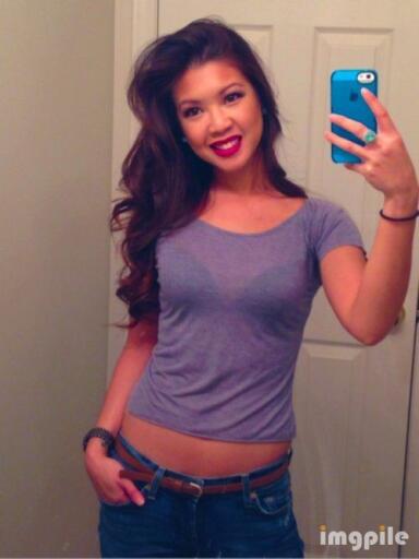 Beautiful girl smiling mirror online iPhone selfie