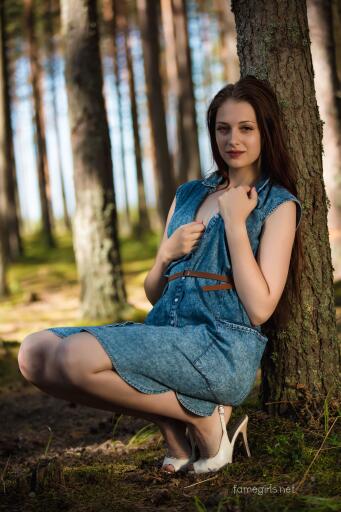 Sitting beside trees Fame Girl isabella 044 In the woods Forest