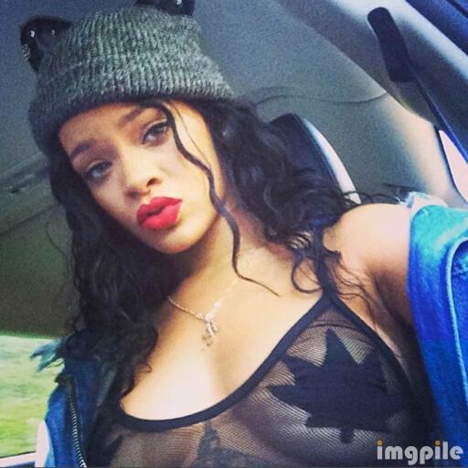 Rihanna iPhone selfie in car black dress