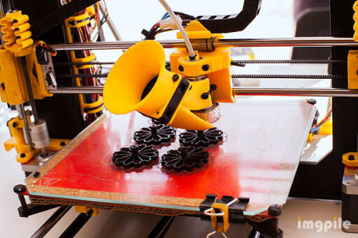 3D printer creating a plastique pieces.