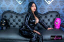 sexualeve Latina domme with black hair dressed in black pvc catsuit