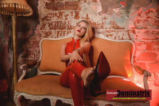 livecamdominatrix blonde mistress in red pvc bodysuit
