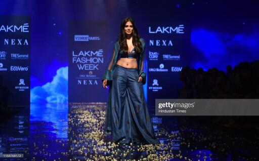 MUMBAI, INDIA - AUGUST 21: Indian actor Malavika Mohanan walks the ramp showcases the outfit of fash
