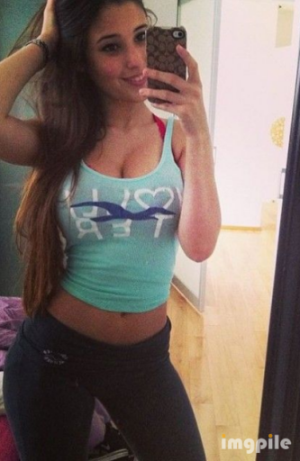 Girl in blue top mirror online iPhone selfie