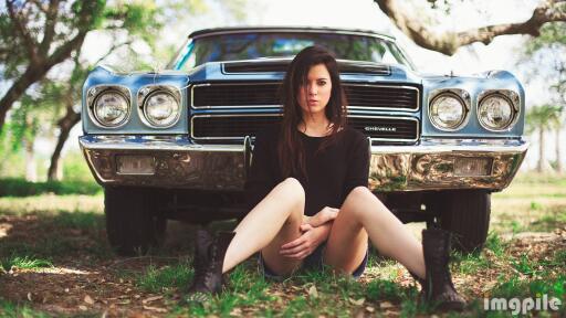 Beautiful girl and classic car
